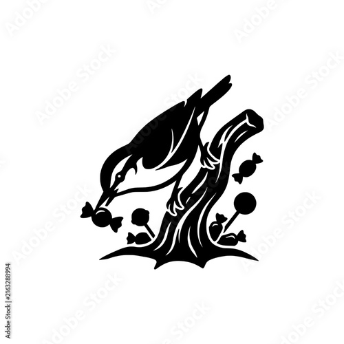 Spooky nuthatch bird climbing tree branch silhouette with Halloween candy for festive