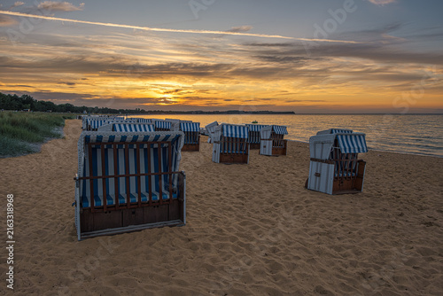 Orange-hued sky over the Baltic Sea near Boltenhagen during a stunning sunset.