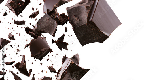 Canvastavla Dark chocolate chunks exploding and scattering, isolated on transparent backgrou
