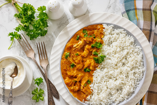 Spiced chicken curry with cooked long grain rice