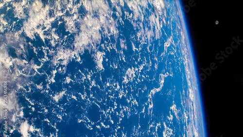 Blue Earth surface in the space. Elements of this image furnished by NASA