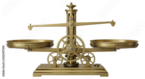 Antique brass balance scale with intricate gears and two pans, on white