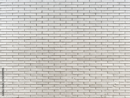 weathered textured white brick wall