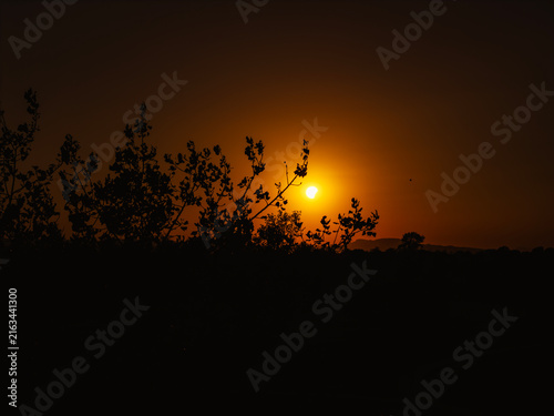 Partial solar eclipse in 2026 at the city of Zagreb, Croatia when moon covered part of the sun at sunset