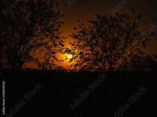 Partial solar eclipse in 2026 at the city of Zagreb, Croatia when moon covered part of the sun at sunset