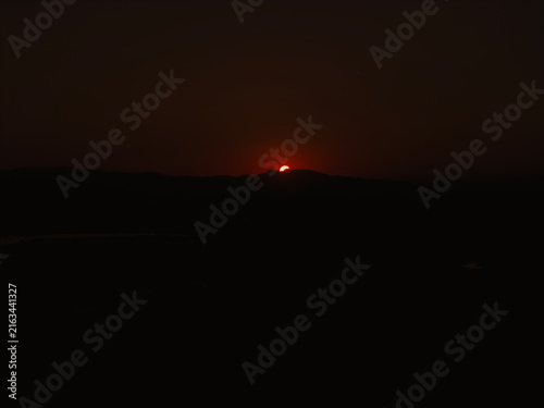 Partial solar eclipse in 2026 at the city of Zagreb, Croatia when moon covered part of the sun at sunset