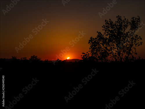 Partial solar eclipse in 2026 at the city of Zagreb, Croatia when moon covered part of the sun at sunset
