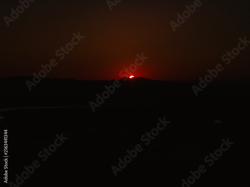 Partial solar eclipse in 2026 at the city of Zagreb, Croatia when moon covered part of the sun at sunset
