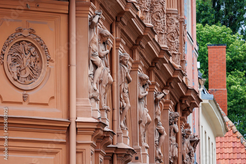 Konstfotografi Allegorical sculptures decorating the Riga Bourse facade in Old Riga, Latvia