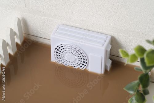 浸水したエアコン室外機