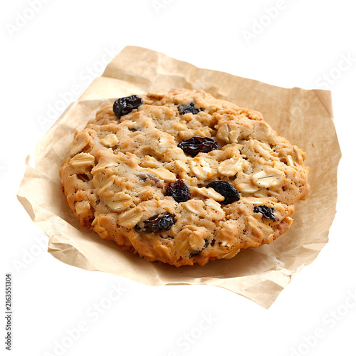 Oatmeal raisin cookie in crisp brown paper liner