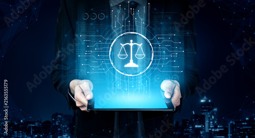 Obraz na płótnie Futuristic digital law interface displaying justice scale, highlighting digital law, AI compliance, digital law systems, and digital law regulations for secure governance