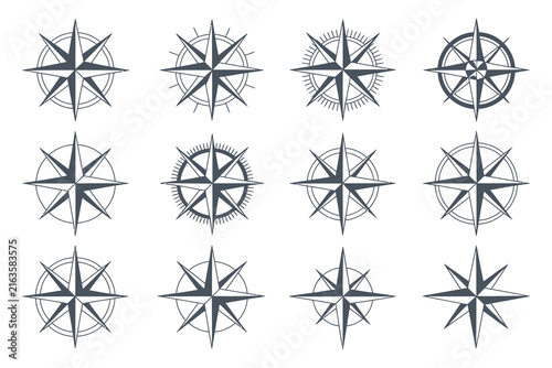 Set of vintage compass rose icons Nautical navigation symbols for maps and travel design