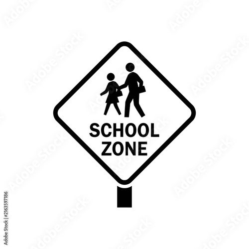 School zone sign with two human figures, an adult and a child, walking together, indicates a designated area for reduced speed and increased caution.