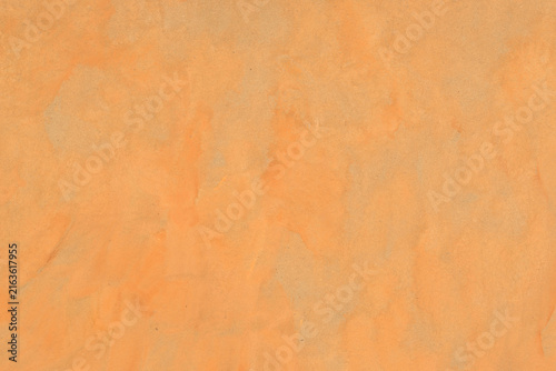 orange watercolor background painted on paper texture