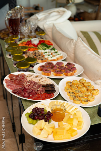 Canvas Print Appetizer buffet with assorted platters and drinks