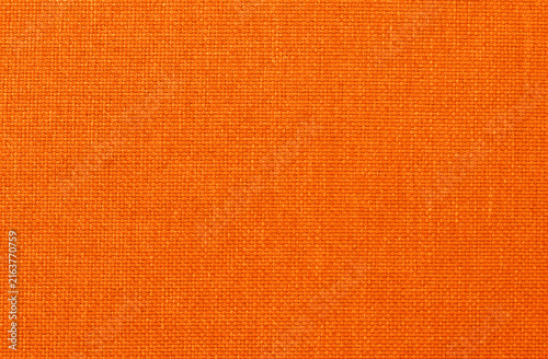 Orange linen fabric cloth texture background, seamless pattern of natural textile.