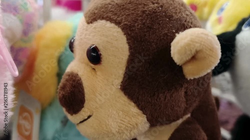 Cute brown monkey doll plush toy close up