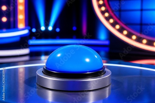 Large blue buzzer button on game show stage