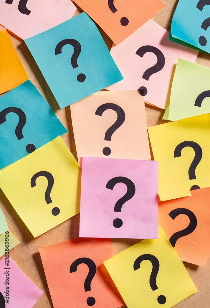 Fototapeta premium Problem solving and decision making concept, many colorful question marks on sticky notes, uncertainty and confusion