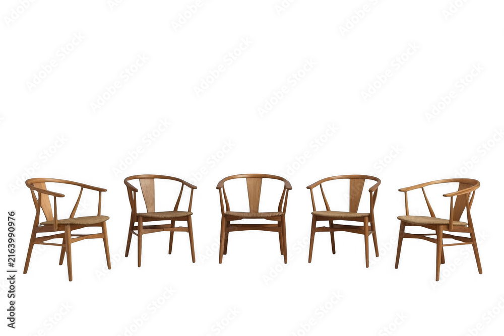 Fototapeta premium Five wooden mid-century modern style chairs with transparent background