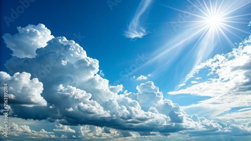 Cuadro en lienzo A bright sunny day with fluffy white clouds in a clear blue sky