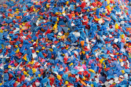 Obraz na płótnie Plastic colorful pieces recycling shredded for industrial use.