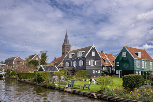 Fotografie Marken is a peninsula connected by a causeway to the waters of Lake Ijssel, in the Netherlands, located in the municipality of Waterland in the province of North Holland