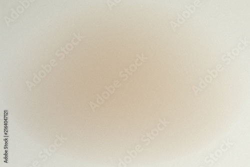 Abstract soft beige gradient background with grainy texture