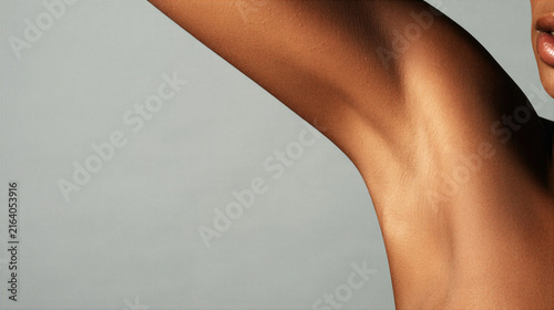 Close up of smooth female armpit skin with natural lighting and soft texture