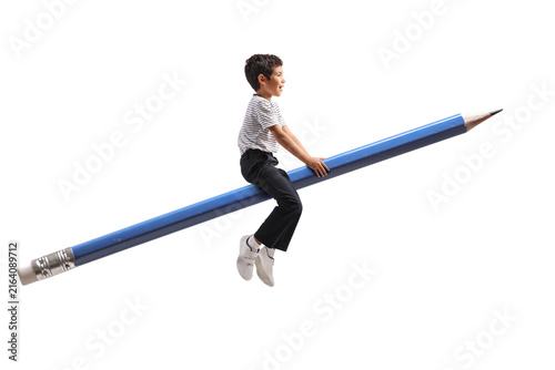 Boy riding a giant blue pencil, back to school theme