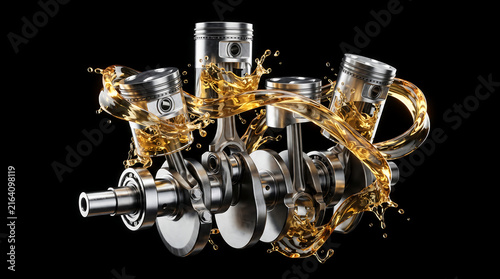 Engine pistons and crankshaft with splashing motor oil isolated on black background