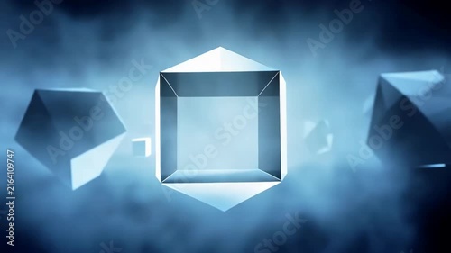Geometric shapes including spheres, cubes, and pyramids float in a misty blue atmosphere, showcasing a dynamic visual progression of three-dimensional forms and reflections