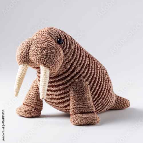 Cute Brown Knitted Walrus Toy Isolated On Light Grey Background