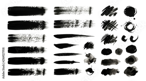 Set of black ink brush strokes and messy paint marks on white background isolated on transparent background