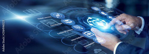 Fotografie Virtual instructor assigning modules on a mobile phone for engaging E-learning across a connected world map, evaluating quiz scores upon a large Virtual screen ensuring student excellence