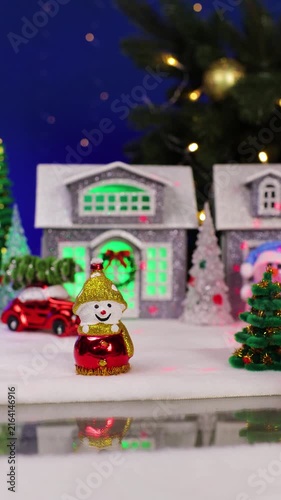 A car drives past the Christmas town