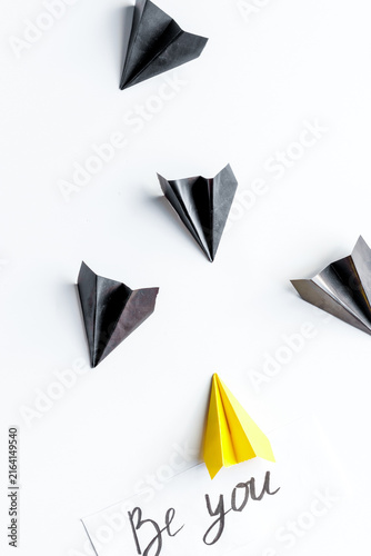 choice concept paper boats on white background top view