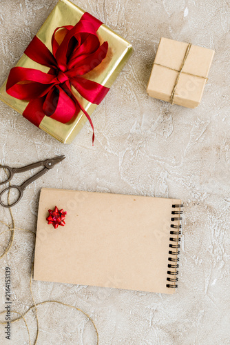 wrapping gifts in box for holiday top view mock up
