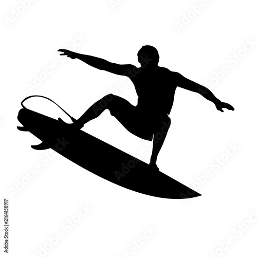 Surfer riding a wave and balancing on a surfboard