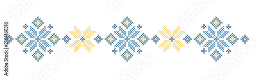 A border featuring traditional Ukrainian cross-stitch floral motifs in yellow and blue