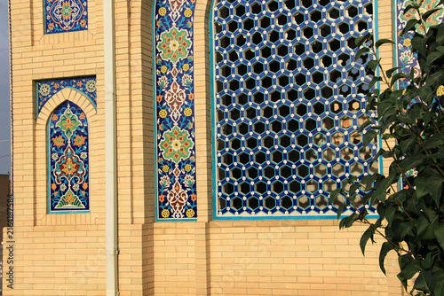A new window made of brick and tile. The window features traditional Uzbek motifs.