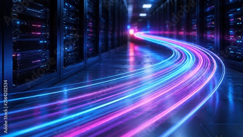 Abstract light trails representing high speed data transfer in a modern server room.
