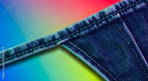 Detailed macro denim fabric with stitching on a vibrant rainbow gradient, 2026 digital asset concepts for modern textile and apparel design