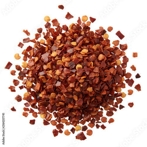Pile Of Red Pepper Flakes Scattered On A White Background