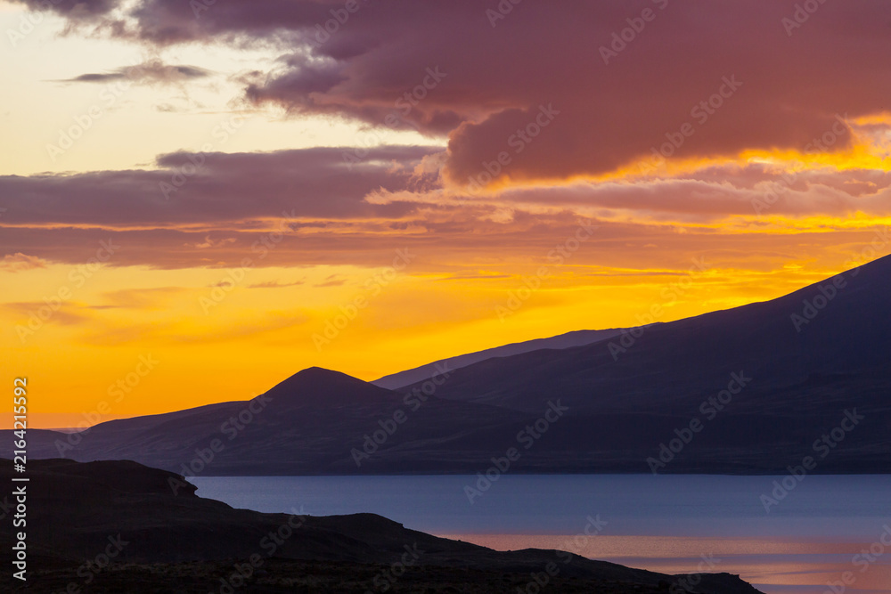 Naklejka premium Mountains in sunset