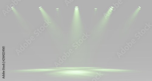 Obraz na plátne Green theatrical spotlights arranged in a row and illuminating the central stage