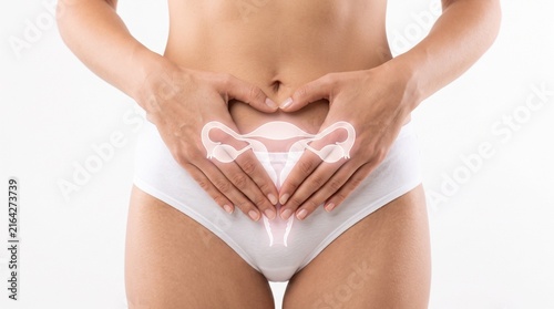 Female body with uterus illustration on abdomen, representing gynecology, reproductive system, menstrual health, and medical awareness.