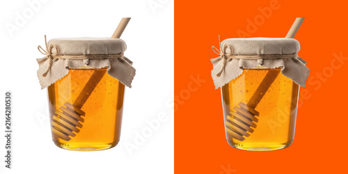 Glass jar filled with golden honey and wooden dipper, rustic food photography transparent png