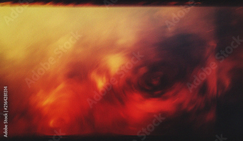 Obraz na plátně Abstract fiery orange and red smoke swirls with dramatic gradient lighting effec